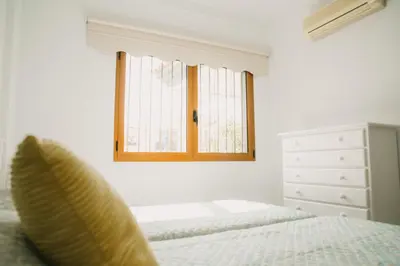 Cama o camas de una habitación en Villa Cervantes Sonnenland con piscina privada climatizada