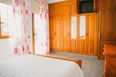 Cama o camas de una habitación en Villa Cervantes Sonnenland con piscina privada climatizada