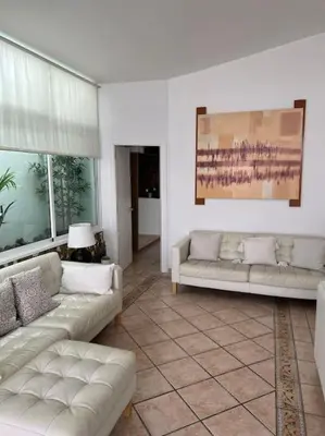 Zona de estar de Casa Macken con piscina climatizada y jacuzzi