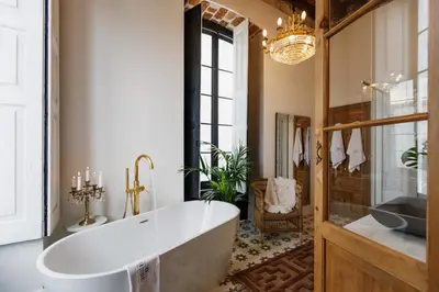 Un baño de La Colonial Suites Apartamentos de Lujo