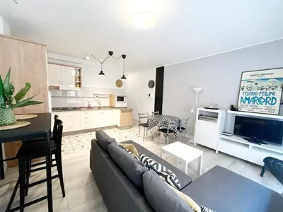 Una televisión o centro de entretenimiento en Velarde Deluxe Beach Flat byCanary365