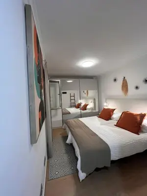 Cama o camas de una habitación en VV Janoa Playa Las Canteras 2