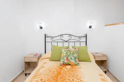 Cama o camas de una habitación en GuestReady - Arenas 104 - Playa del Ingles JF
