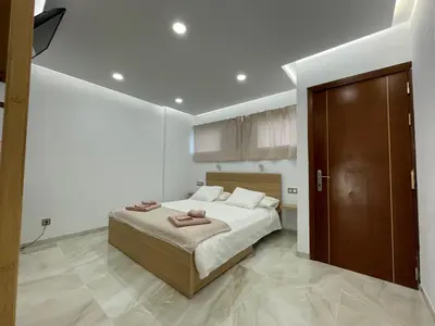 Cama o camas de una habitación en BAMBOO CHIC APARTMENT PLAYA DEL INGLES