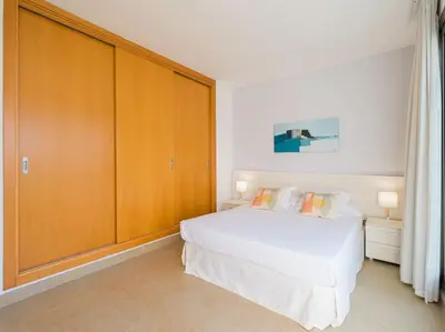 Cama o camas de una habitación en Salobre Villas Golfers