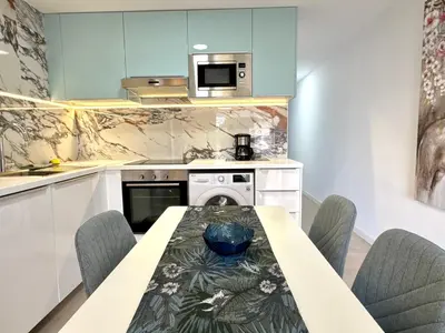 Una cocina o zona de cocina en Apartamento Tamarán 105