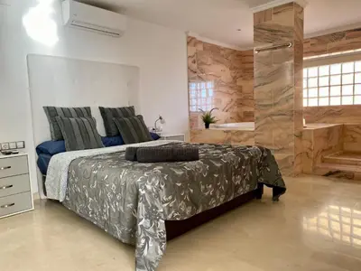 Cama o camas de una habitación en Sunset Ocean Beach Point Oceanvrent