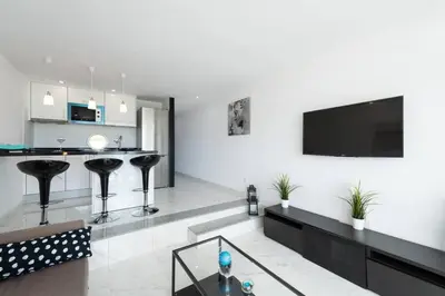 Una televisión o centro de entretenimiento en PARADISE VIEW APARTMENT MASPALOMAS