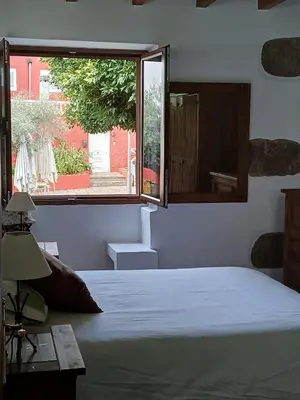Cama o camas de una habitación en Casa Rural Carmita