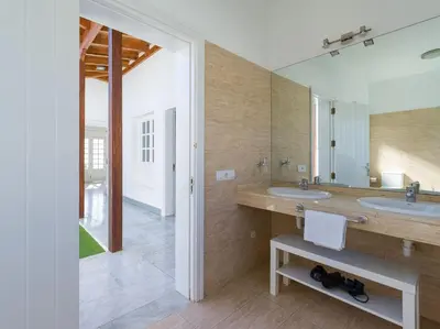 Un baño de Pasito Villas