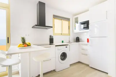 Una cocina o zona de cocina en Home2Book Design Sea Front Las Canteras1 Beach