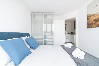Cama o camas de una habitación en Home2Book Design Las Canteras2 Beach