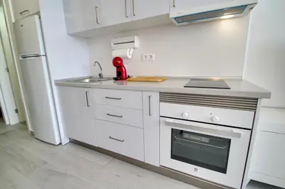 Una cocina o zona de cocina en Schöne Wohnung mit Meerblick - Playa de Arguineguin