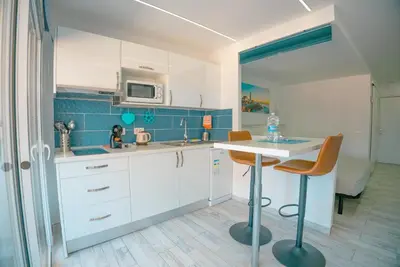 Una cocina o zona de cocina en Piso Paraíso vicino al mare