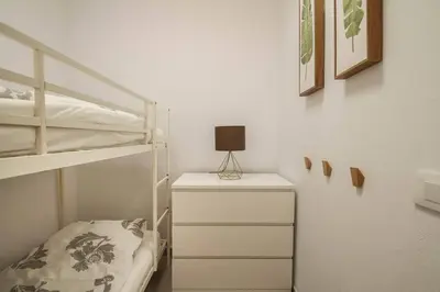 Cama o camas de una habitación en cozy & modern bungalow w/private garden bbq+wifi