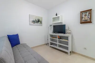 Una televisión o centro de entretenimiento en Arinaga Playa 3