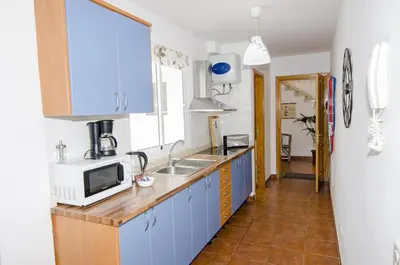 Una cocina o zona de cocina en Comfortable apartment in Lomo Quiebre, sea view and mountain