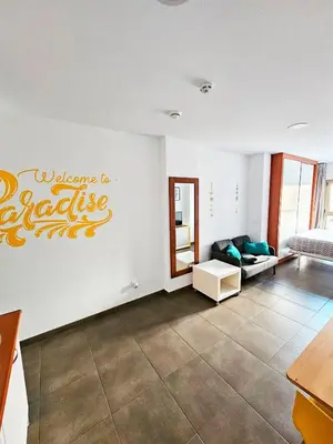 Zona de estar de Lala Loft Las Canteras