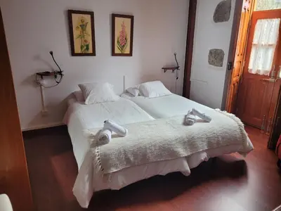 Cama o camas de una habitación en Casa Rural Encarna