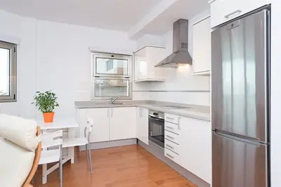 Una cocina o zona de cocina en Alojamiento en primera línea de playa en Arinaga
