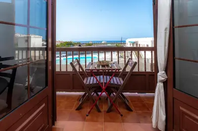 Un balcón o terraza de Casa Playa María
