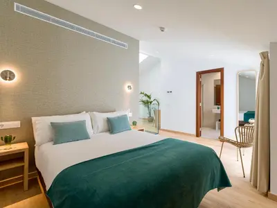 Cama o camas de una habitación en Hotel Emeté & Coworking by Airnest