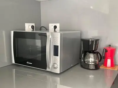 Una cocina o zona de cocina en Sand Feet Apartment