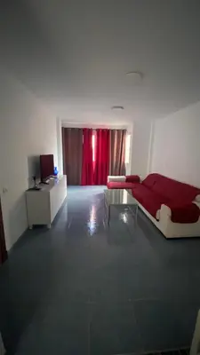Cama o camas de una habitación en Apartamento Islas Malvinas 39
