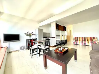 Una televisión o centro de entretenimiento en Apartamento vacacional sur de Gran Canaria, segunda linea de playa con wifi