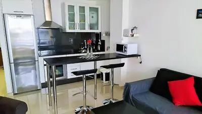Una cocina o zona de cocina en Yumbo Holiday Apartment - Tanife ROOS
