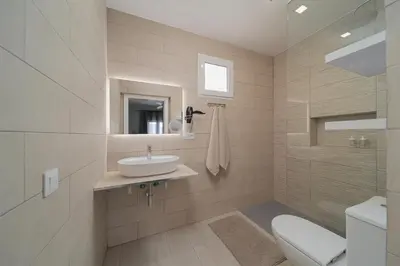 Un baño de Melina