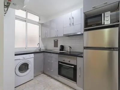 Una cocina o zona de cocina en Surf Brothers