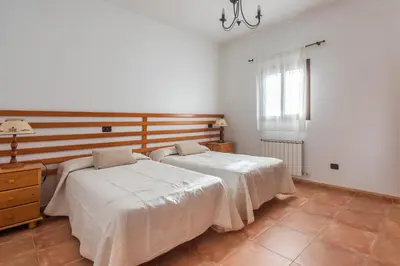 Cama o camas de una habitación en Villas el Alto