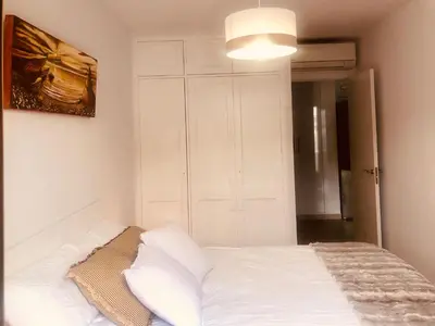 Cama o camas de una habitación en Relax & enjoy Cumana II Puerto Rico
