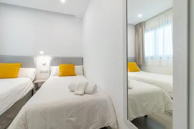 Cama o camas de una habitación en Modern Flat Las Canteras