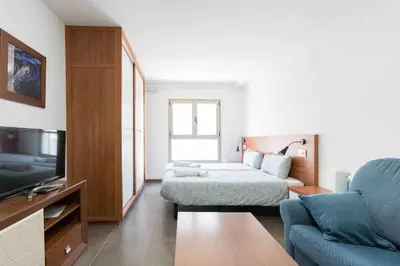 Cama o camas de una habitación en LA CICER BEACH APARTMENT ll