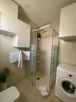 Un baño de Apartamento a pocos metros de la playa