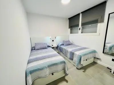Cama o camas de una habitación en Apartamento Parque Jardín