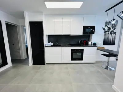 Una cocina o zona de cocina en Apartamento Parque Jardín