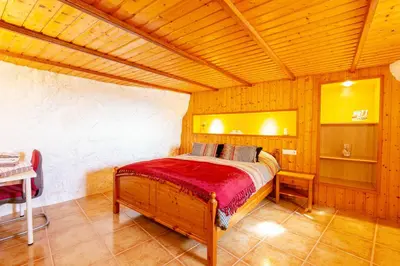 Cama o camas de una habitación en La Cueva de Tito-Casa Cueva en plena naturaleza