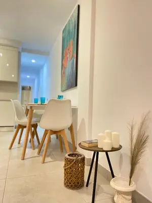 Una televisión o centro de entretenimiento en Viuter - Magna Home las Canteras Beach + Parking
