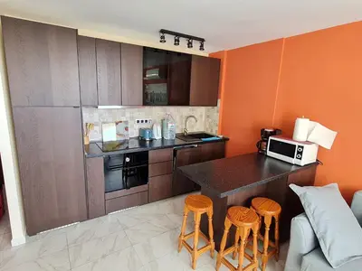 Una cocina o zona de cocina en Cozy apartment very close to Yumbo Center