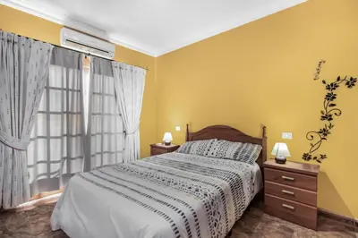 Cama o camas de una habitación en Solarium Agaete Valley Retreat 3-BR