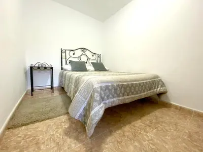 Cama o camas de una habitación en Welcoming house with mountain view in Ingenio