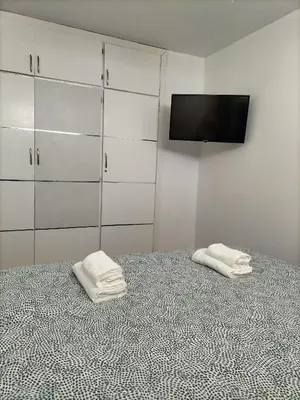 Cama o camas de una habitación en Sunny Suite Tanife by Yumbo