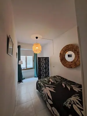 Cama o camas de una habitación en KYO Surf Hostel