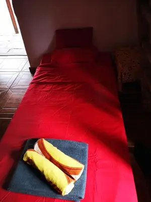 Cama o camas de una habitación en La Cueva Refugio