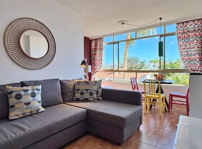 Zona de estar de Cosy Garden View Apartment Tinache