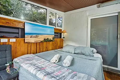 Una televisión o centro de entretenimiento en Finca OASIS Fataga