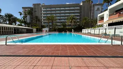 Piscina en o cerca de Top-Apartment in Apartamentos Danubio, 4 Etage, Poolblick und seitlicher Meerblick, Wohnzimmer und 1 Schlafzimmer, im Herzen von Playa del Inglés , Gran Canaria